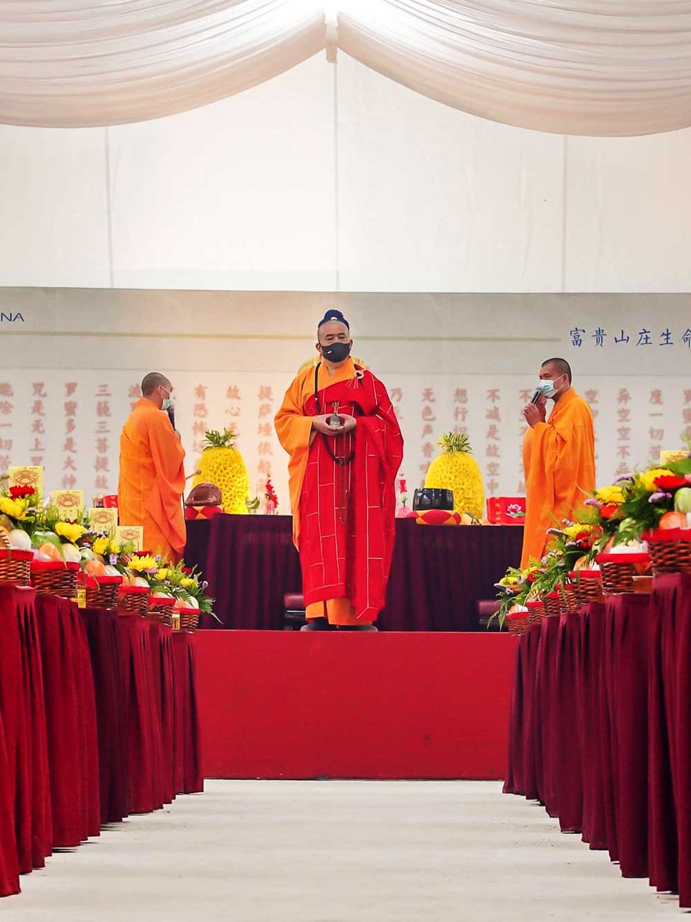 Buddhist Monk Doing Prayer Service